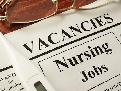 Newspaper nursing job vacancy page with themometor