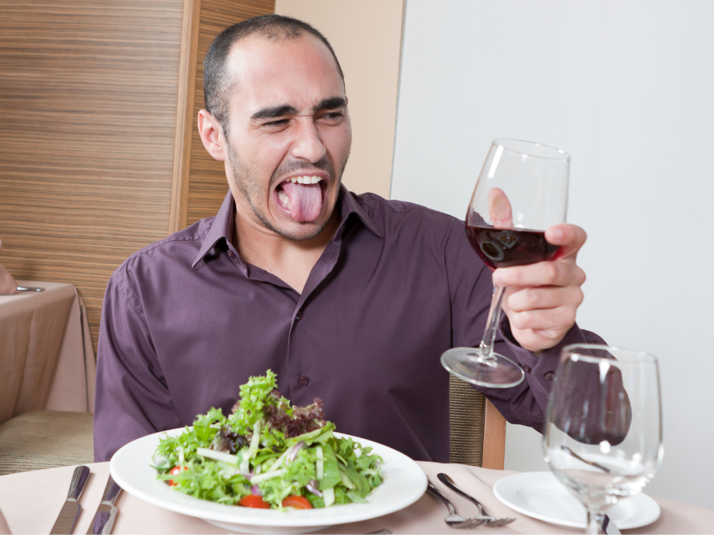 Man tasting bad wine